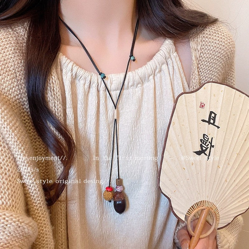 Wholesale New Chinese Zen retro feather necklace double layer long sweater chain Bohemian